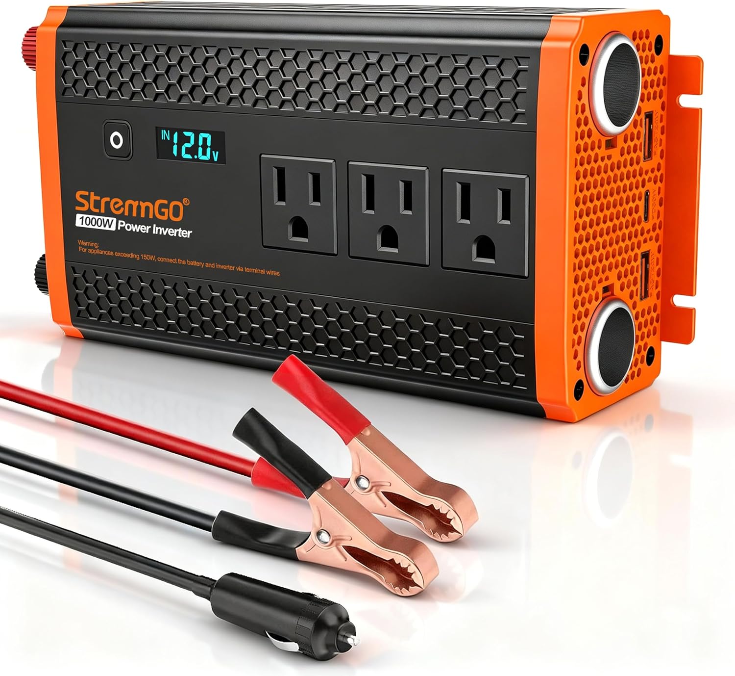The StrenrmGO 1000W inverter with 3 AC outlets, an LED voltage readout, USB-C and USB-A ports, and battery clamp cables