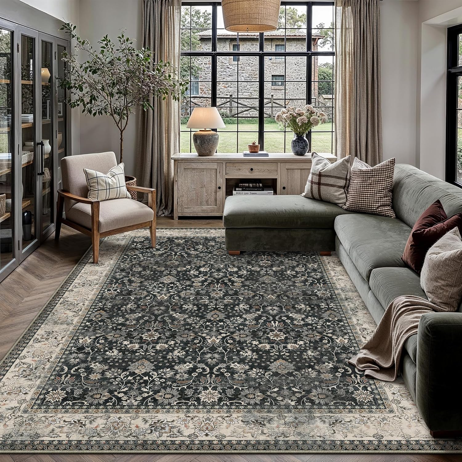 A black and beige floral HUGEAR 8x10 rug styled in a living room