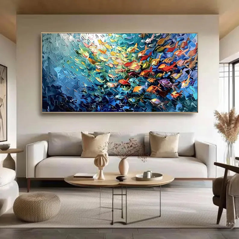 Colorful Fish Wall Art with thick palette-knife texture, one of Artextured's textured oil paintings shown above a sofa