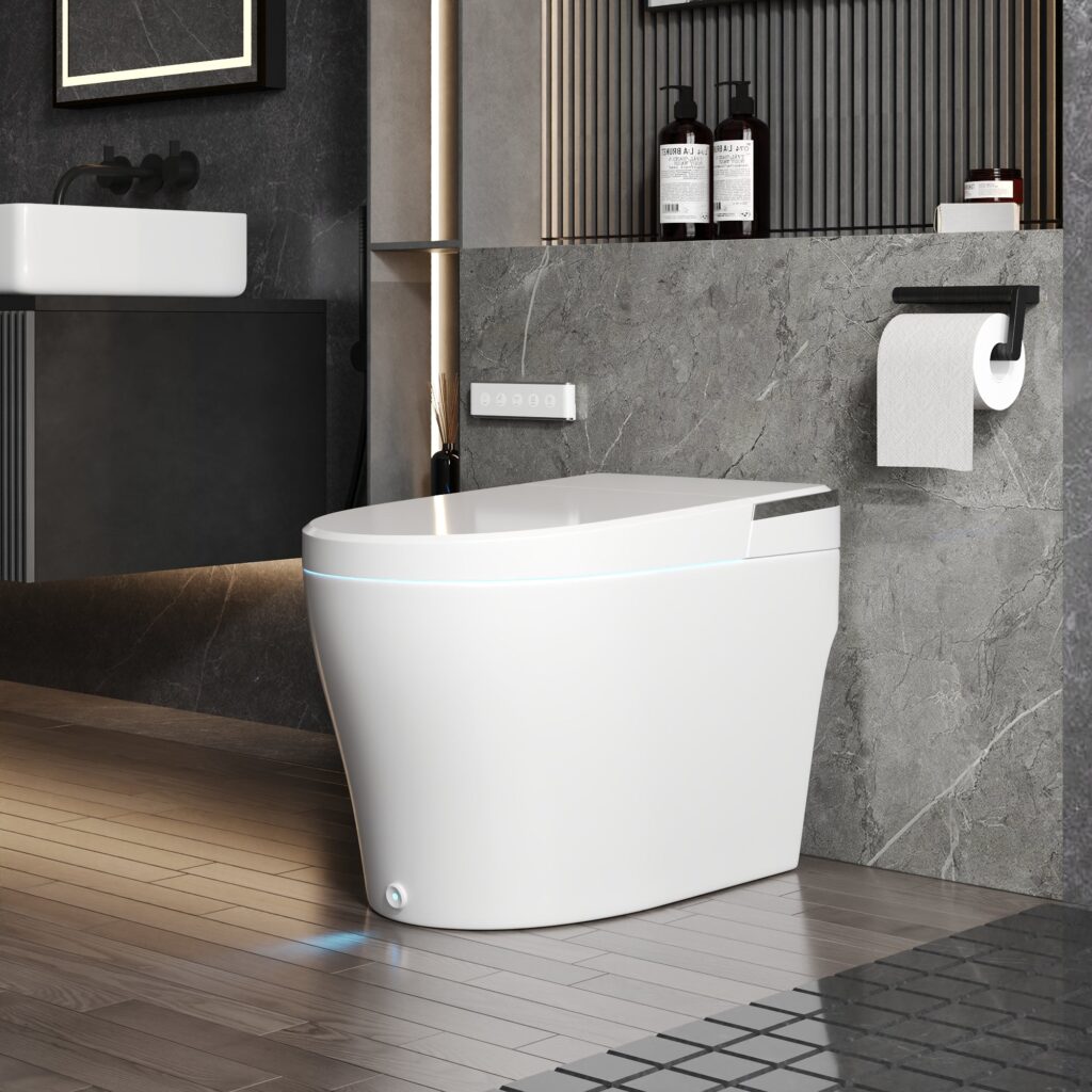 Side view of a white smart toilet with a wall-mounted control panel, a floating vanity and gray stone wall behind it