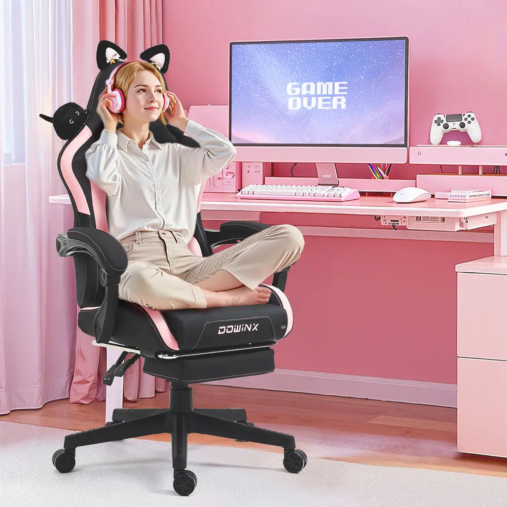 Black and pink Dowinx gaming chair with a cat-ear headrest in a pink gaming room