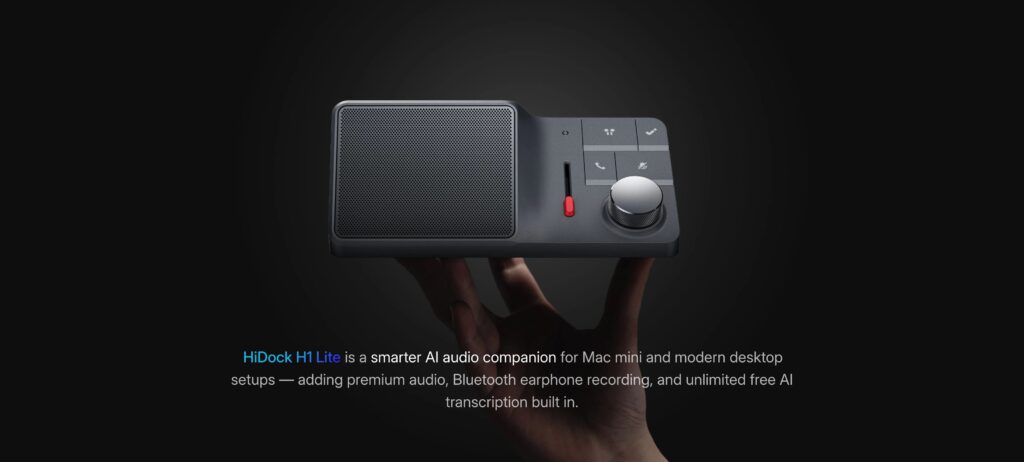 HiDock H1 Lite desk device held in a hand against a dark background