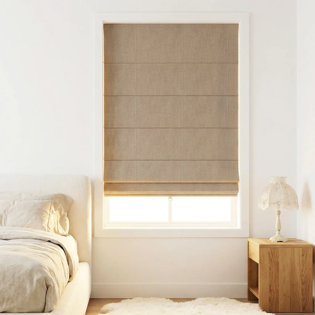 inCustom cordless blackout Roman shade LM365 hanging over a bedroom window