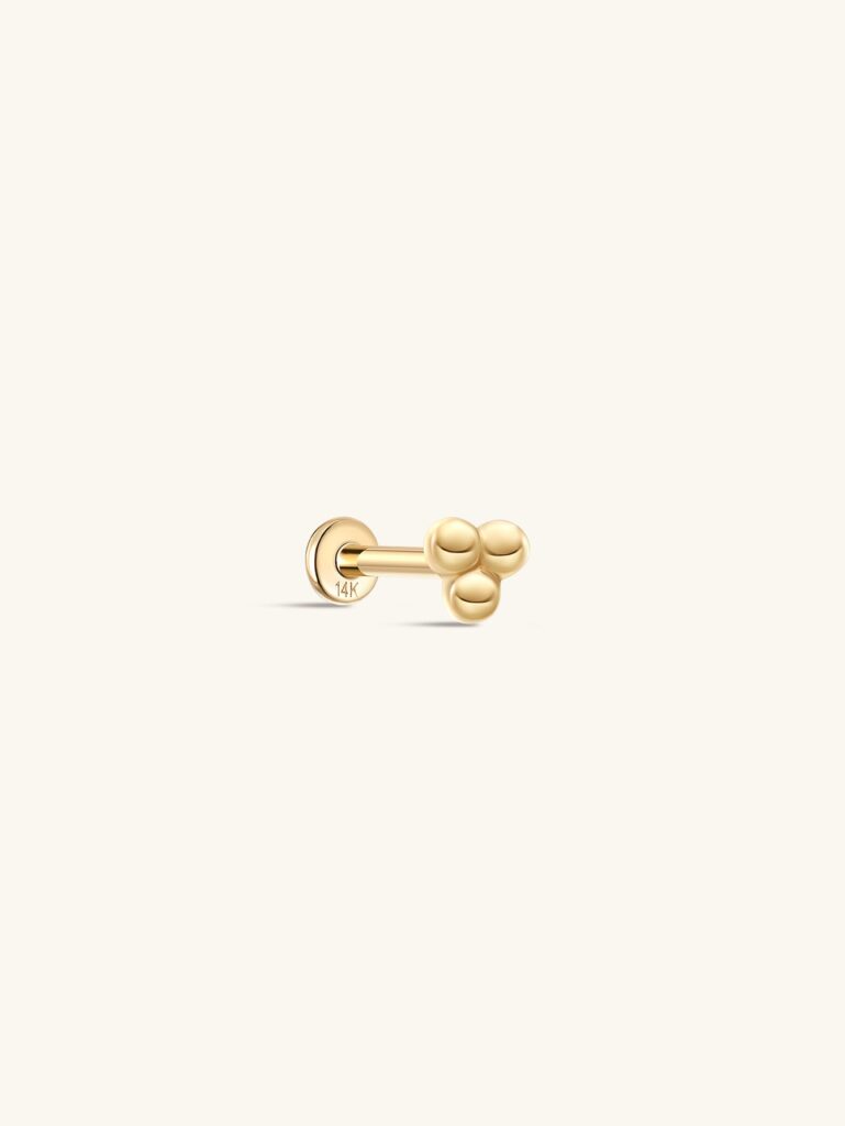 Kosiner 14K gold flat-back stud topped with a cluster of three small polished balls, showing the low disc back stamped 14K