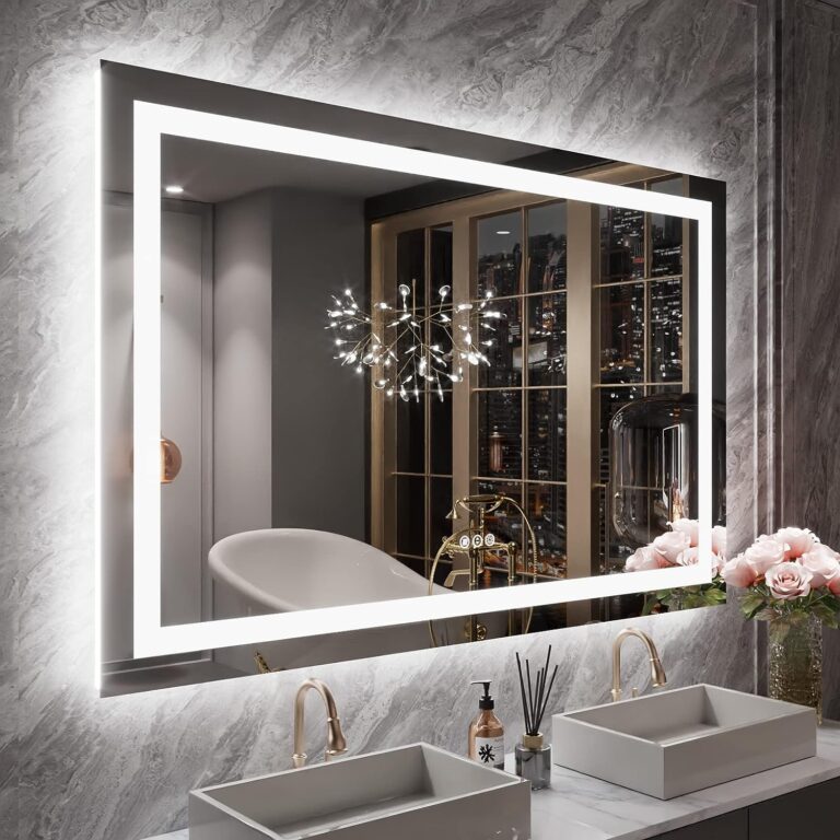 LOAAO LED bathroom mirror with a bright lit border above a double sink