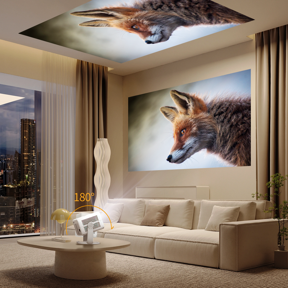 A small white projector on a living room coffee table beaming a fox photo onto the wall and ceiling