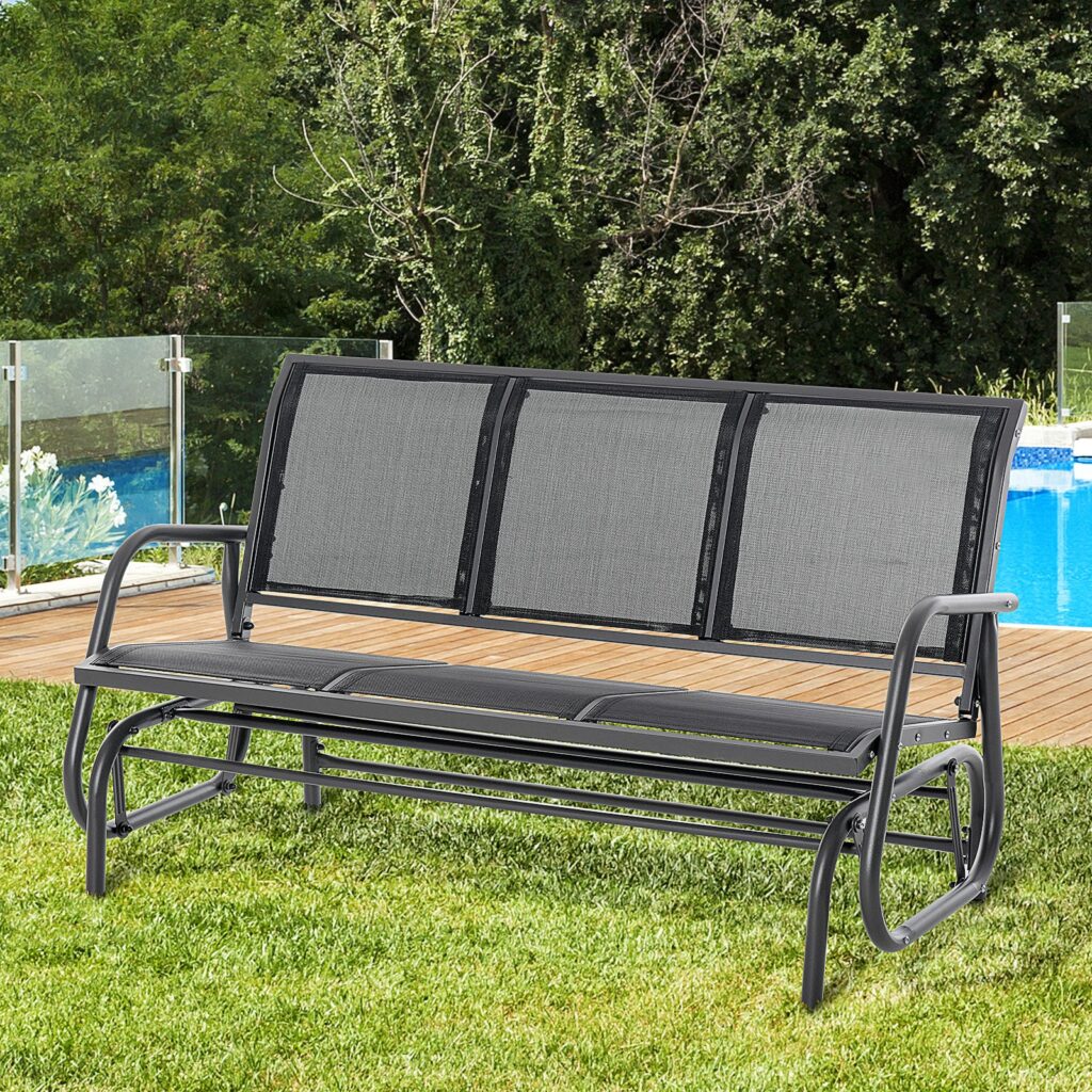 Black Outsunny three-person mesh glider bench on a lawn beside a glass pool fence