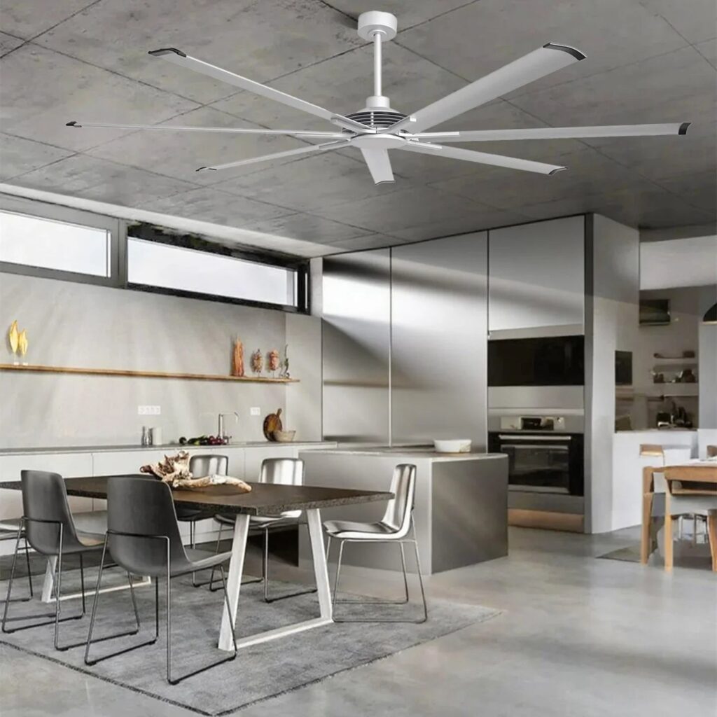 Silver Parrot Uncle large ceiling fan hanging over a modern open kitchen and dining area