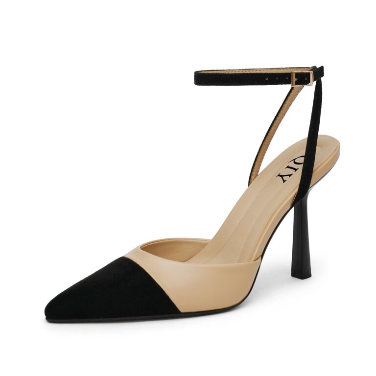 QIY ankle strap stiletto in nude with a black pointed toe cap, shown from the front at an angle