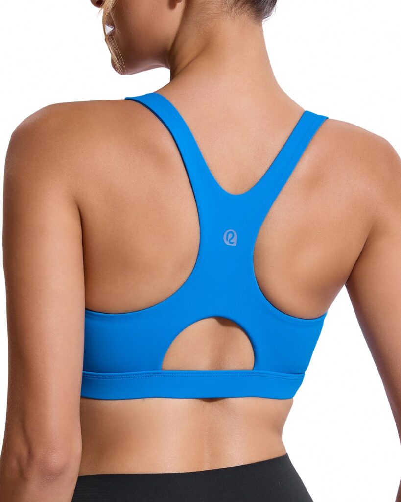 Back view of a bright blue racerback sports bra with a cutout at the lower back