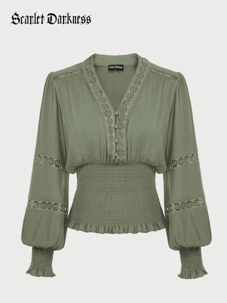Green smocked-waist V-neck Scarlet Darkness top with lace trim and long sleeves
