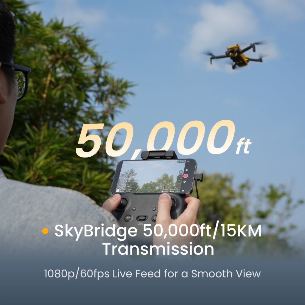 Pilot holding a SkyRover remote with a phone mounted for the 1080p live feed while the drone flies overhead