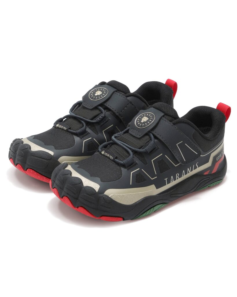 Black Taranis Win Start Ultra trail shoes with GORE-TEX labels, a dial closure and a red and green rubber outsole