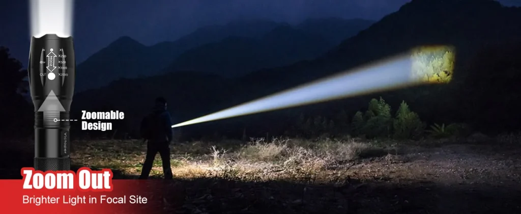 A flashlight zoomed to a narrow spot beam that reaches across a dark field at night