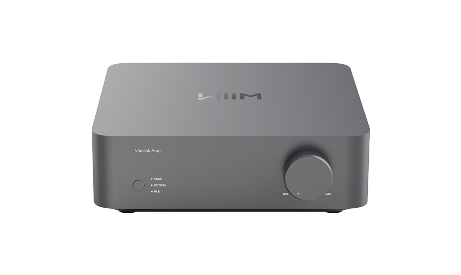 WiiM Vibelink Amp front panel with a large volume knob and coax, optical and RCA input lights