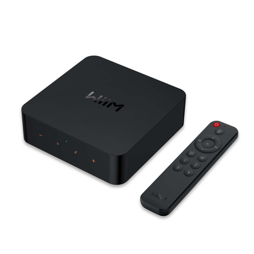 WiiM Pro Plus streamer box shown next to its voice remote